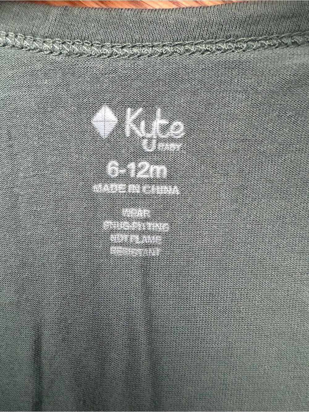 Rarely worn Kyte Baby zipper romper. 6-12 months. Color Pine